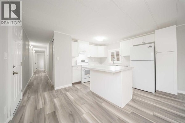 Laundry room - 57, 6220 17 Avenue, Calgary, AB T2A0W6 Photo 3
