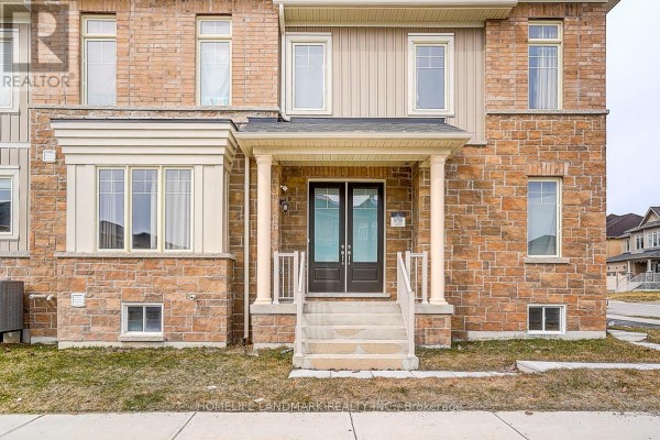 Kitchen with light gray cabinets, stainless steel appliances, and window. - 57 Faimira Avenue, Georgina