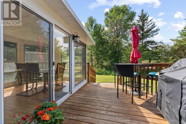 Deck with outdoor dining set and grill - 57 Krause Street Laurentian Valley