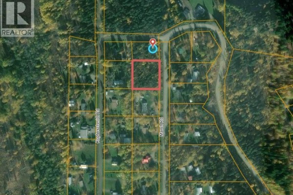 Aerial map showing property boundaries of 570 Marsh Road with surrounding lots, roads, and houses. - 570 Marsh Road, Quesnel