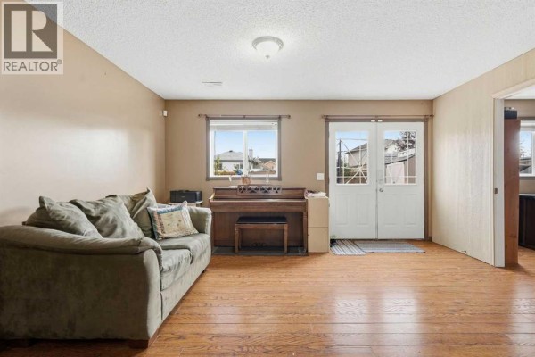 Living room - 58 Cimarron Meadows Road, Okotoks, AB T1S1T6 Photo 3