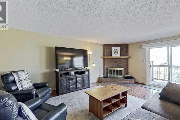 Living room - 5803 Dalgleish Road Nw, Calgary, AB T3A1K4 Photo 4
