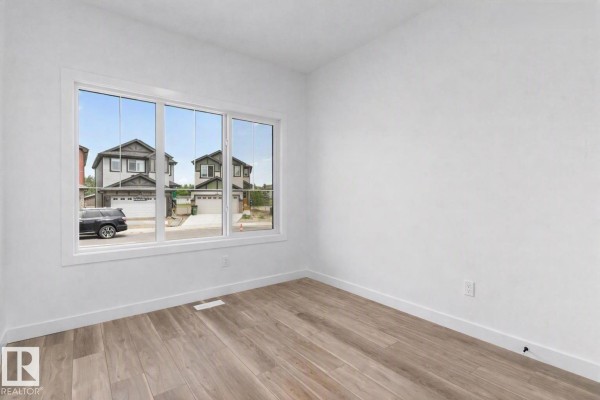 Kitchen - 589 177 Av Ne, Edmonton, AB T5Y4P6 Photo 3
