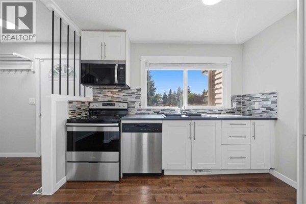Kitchen - 59, 6100 4 Avenue Ne, Calgary, AB T2A5Z8 Photo 2