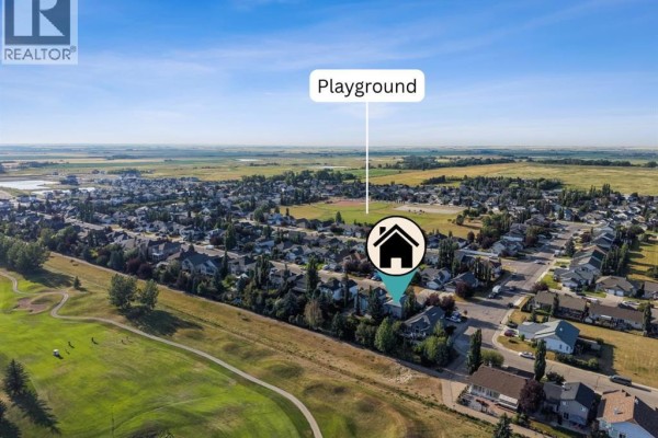 Aerial view of a residential neighborhood with a playground labeled, overlooking a golf course. - 59 Hillview Road, Strathmore