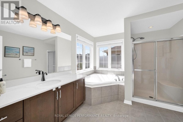 Corner tub, separate shower, double vanity bathroom - 593 Pinawa Circle Ottawa