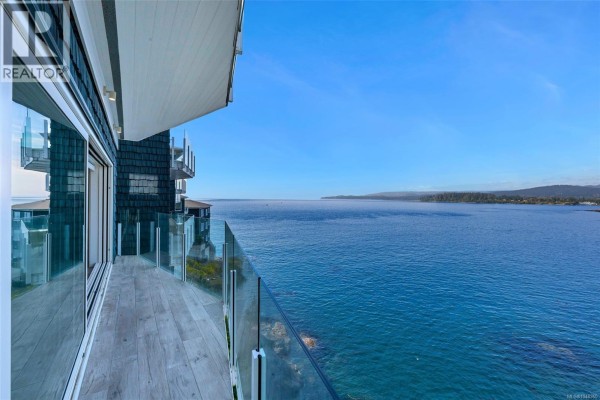 Floor plan of a 948 sq ft apartment with two bedrooms and a deck. - 5b 1000 Sookepoint Pl, Sooke