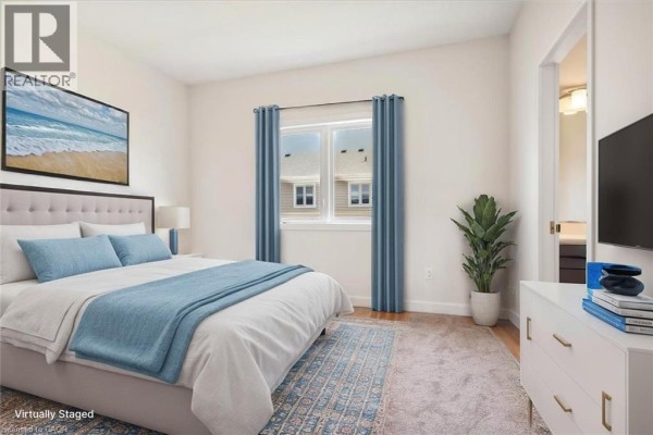 Bedroom with a king-size bed, blue curtains, a dresser, and a plant. - 5b Shores Lane, Crystal Beach
