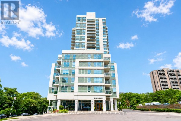 Exterior view of a modern multi-story apartment building with balconies and large windows under a blue sky. - 506 - 10 Wilby Crescent, Toronto