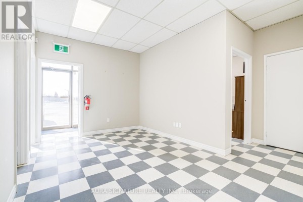 Interior room with checkered tile flooring and natural light - 6 - 176 Rivermede Road, Vaughan