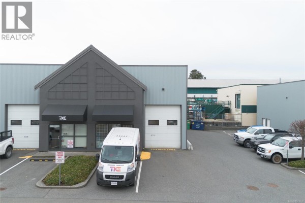 Open loading area with high ceilings and overhead lighting. - 6 2535 Mccullough Rd, Nanaimo