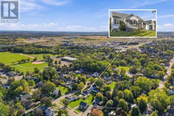 Aerial view of the neighbourhood with an inset photo of the white bungalow at 6 Albert Street, Whitby. - 6 Albert Street, Whitby