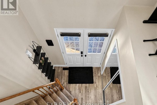 Double front doors with glass panes and mirrored closet doors - 6 Booth Lane Barrie