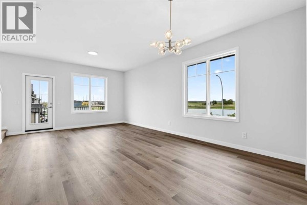 Living room - 6 Hotchkiss Parade Se, Calgary, AB T3S0X5 Photo 4