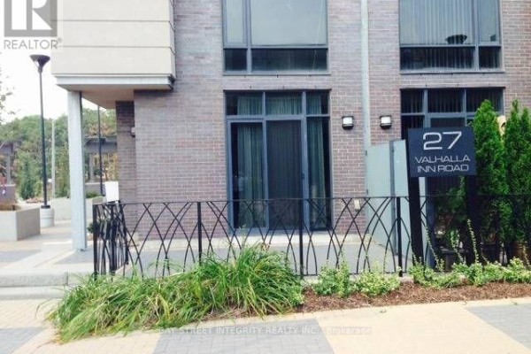 Entrance to townhouse 27 Valhalla Inn Road with a black metal fence and landscaping. - 60 - 27 Valhalla Inn Road, Toronto