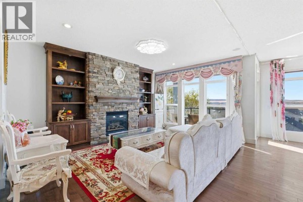 Living room - 60 Heritage Green, Cochrane, AB T4C0L3 Photo 2