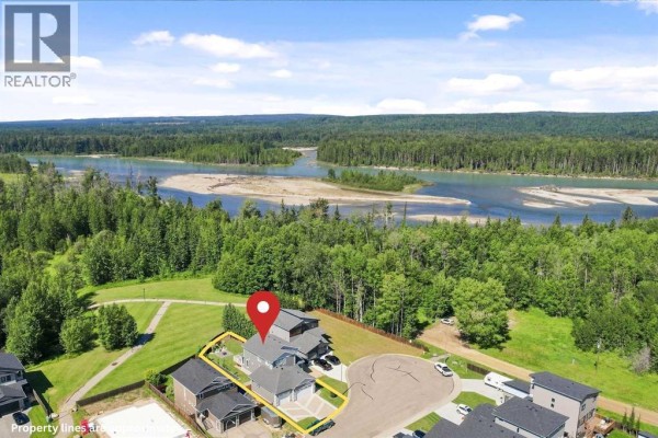 Walk-in shower with tiled walls, glass door, and view into bedroom. - 60 Pritchard Drive, Whitecourt