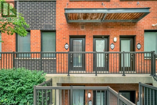 Close-up of townhouse entrances numbered 60, 61, and 62 on a balcony. - 60 Winston Park Boulevard Unit# 60, Toronto