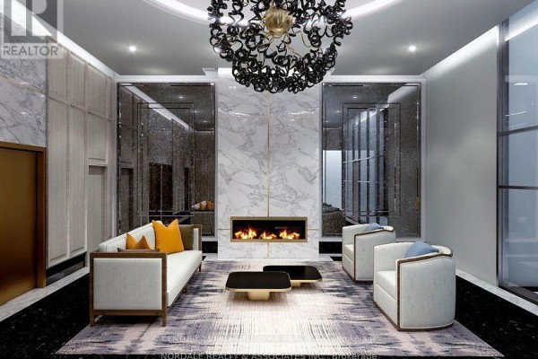 Elegant living room with a fireplace, marble accent wall, and modern seating. - 601 - 2450 Bloor Street W, Toronto
