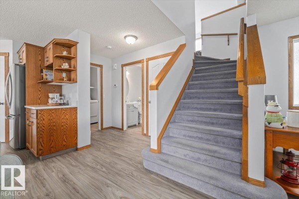 Family room - 6014 48 Av, Beaumont, AB T4X0A3 Photo 4