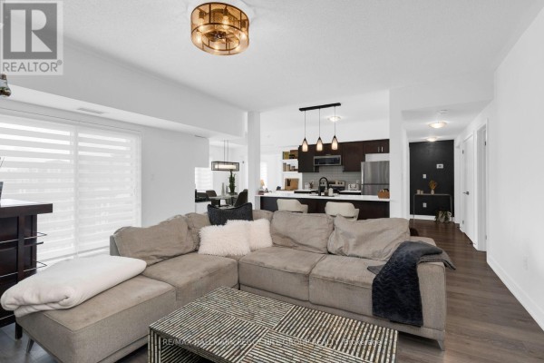 Living room - 602 - 10 Culinary Lane, Barrie, ON L9J0K2 Photo 4