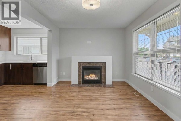 Living room - 603, 50 Belgian Lane, Cochrane, AB T4C0Y5 Photo 4