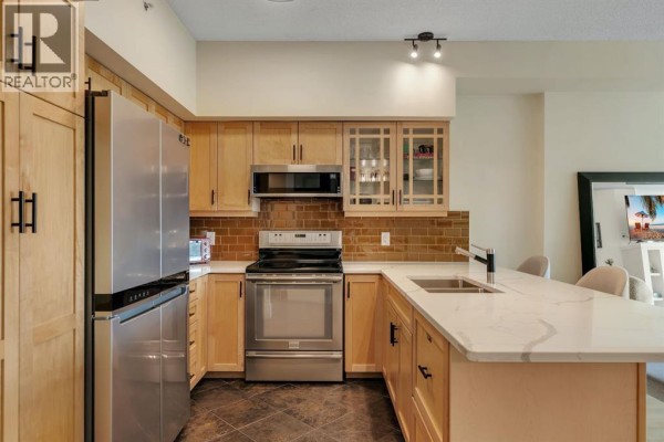 Dining room - 604, 205 Riverfront Avenue Sw, Calgary, AB T2P5K4 Photo 3