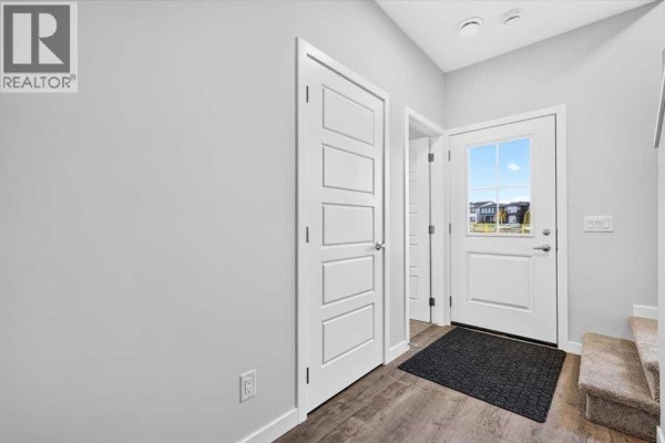 Living room - 605, 321 Hotchkiss Drive Se, Calgary, AB T3S0X5 Photo 3