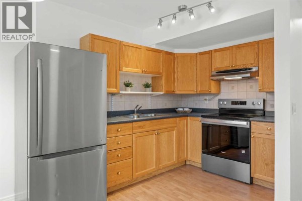 Kitchen - 605, 6223 31 Avenue Nw, Calgary, AB T3B3X2 Photo 3