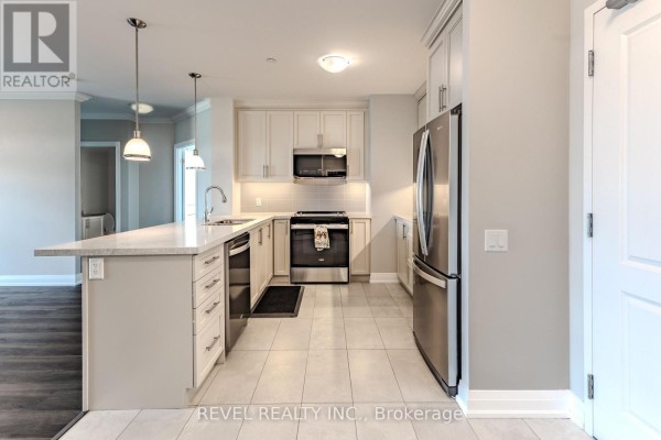 Living room - 605 - 830 Megson Terrace, Milton, ON L9T9M7 Photo 5