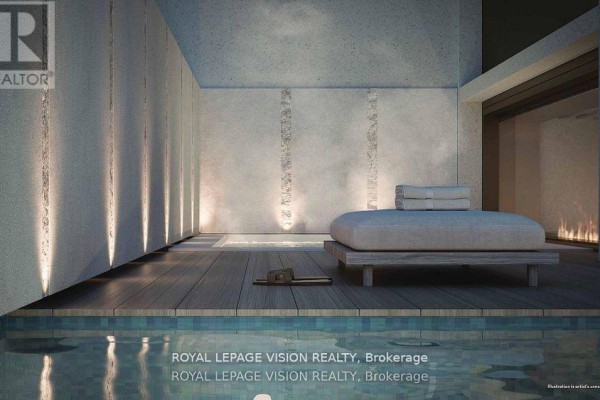 Indoor swimming pool area with wooden deck, lounge chair, and subtle strip lighting on textured walls. - 606 - 1315 Bay Street, Toronto