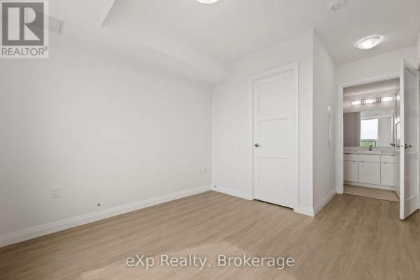 Primary Bedroom - 606 - 93 Arthur Street S, Guelph, ON N1E0T3 Photo 3