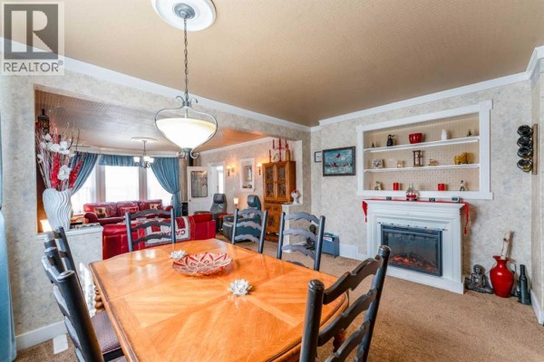 Family room - 606 Main Street, Pincher Creek, AB T0K1W0 Photo 3