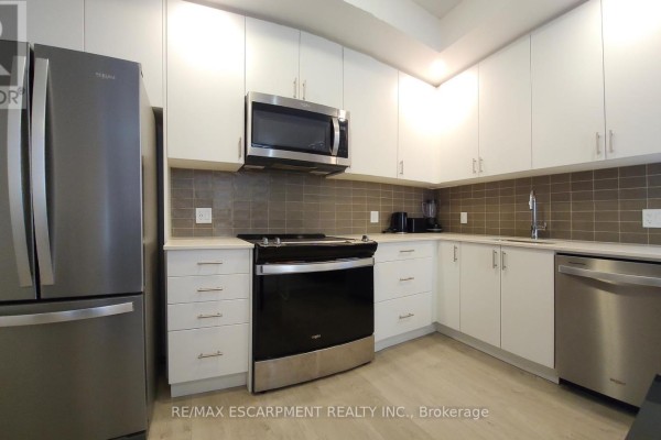 607 - 3220 William Coltson Avenue, Oakville, ON, photo 3