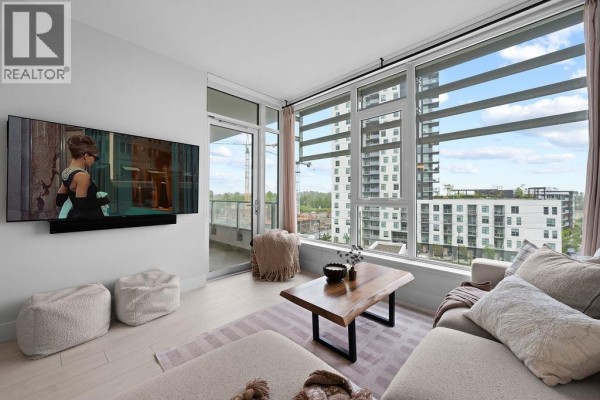 Contemporary kitchen with light wood and grey cabinetry, stainless steel appliances, and island. - 607 3438 Sawmill Crescent, Vancouver