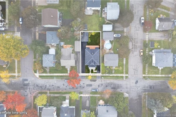 Overhead aerial view of the property lot at 61-63 Burlington Avenue with neighboring homes. - 61-63 Burlington Avenue, Moncton