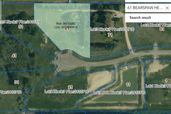 Aerial map highlighting lot 61 with parcel details and surrounded by other numbered lots. - 61 Bearspaw Heights Place, Rural Rocky View County