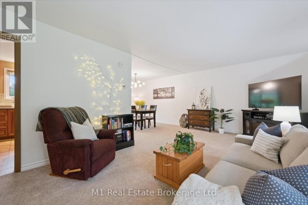 Living room with recliner, sofa, dining set & fairy lights - 610 St David Street S Centre Wellington