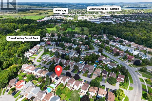 Aerial view showing the property surrounded by suburban homes, parks, and highways. - 6109 Forestglen Crescent, Ottawa