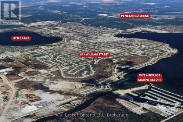 Wide aerial view of the area including 611 William Street and Little Lake. - 611 William Street, Midland