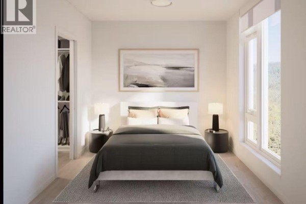 Bedroom with a queen-size bed, nightstands, closet, and a large window with natural light. - 612 Elmwood Street, Coquitlam