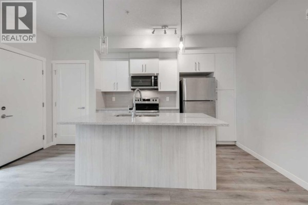Dining room - 615, 400 Belmont Street Sw, Calgary, AB T2X4C1 Photo 3