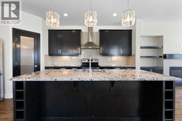 Family room - 615 50 Avenue Sw, Calgary, AB T2S1H6 Photo 3