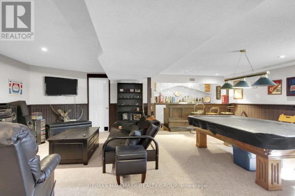 Pool table and bar in basement rec room - 6151 Malakoff Road Ottawa