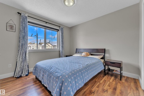 Primary Bedroom - 6159 12 Av Sw, Edmonton, AB T6X0M5 Photo 5