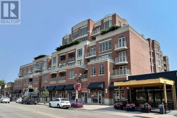 Street view of the brick apartment building with shops on the ground floor. - 619 - 10101 Yonge Street, Richmond Hill