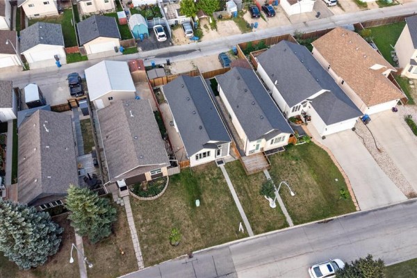 Aerial view of a Winnipeg neighborhood showing multiple residential properties and their lot layouts. - 62 La Porte Drive, Winnipeg
