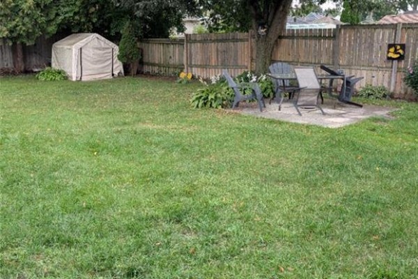 Yard with patio, furniture, shed, and fence - 62 Ninth Avenue Brantford