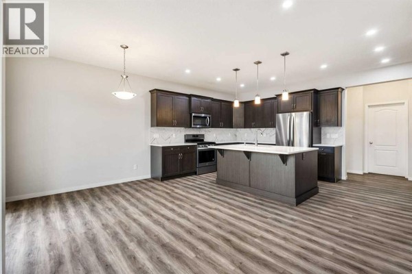 Den - 62 Wolf Hollow Way Se, Calgary, AB T2X1T8 Photo 4
