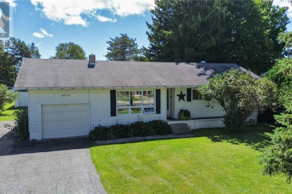 Single-story home with attached garage and paved driveway - 6219 Highway 542 Mindemoya, Manitoulin Island